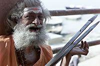 Holy man plays traditional instrument in India (photo: Michael Lund)